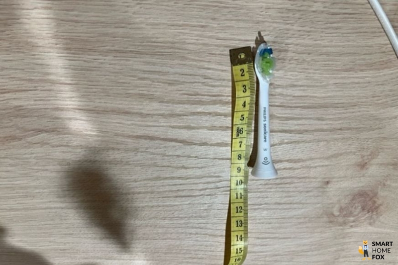 Electric toothbrush brush head size.